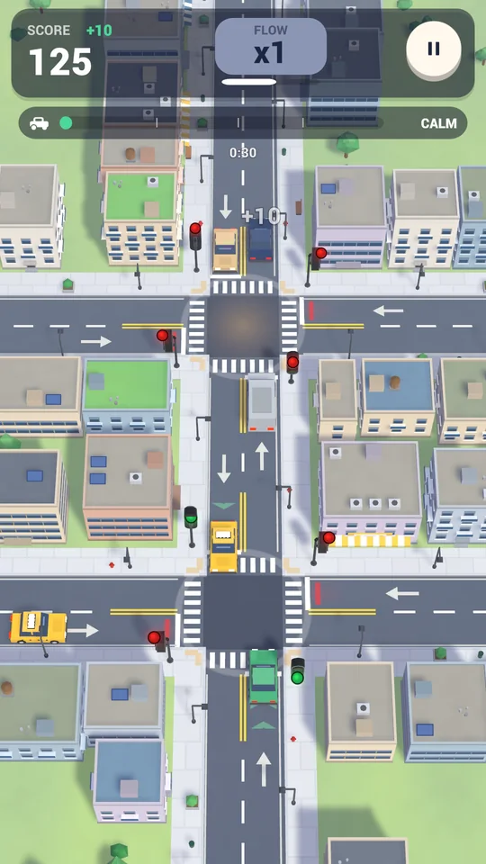 A downtown grid with two crossroads and queues of cars at red lights.